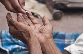 closeup on hands receiving alms