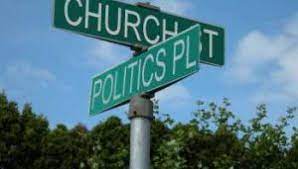 street signs: crossing of church and politics