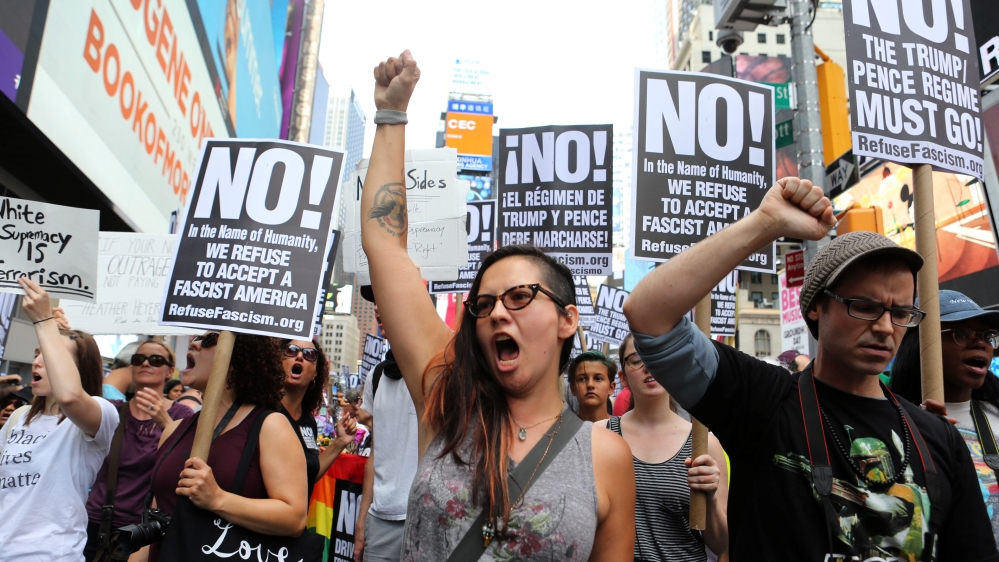 political protesters marching with signs