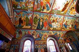 icons covering church walls and ceiling