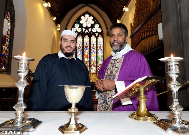 muslim cleric with Christian minister in a church