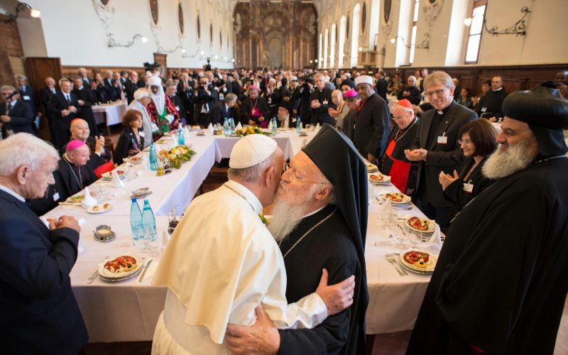 Pope and Patriarch embrace